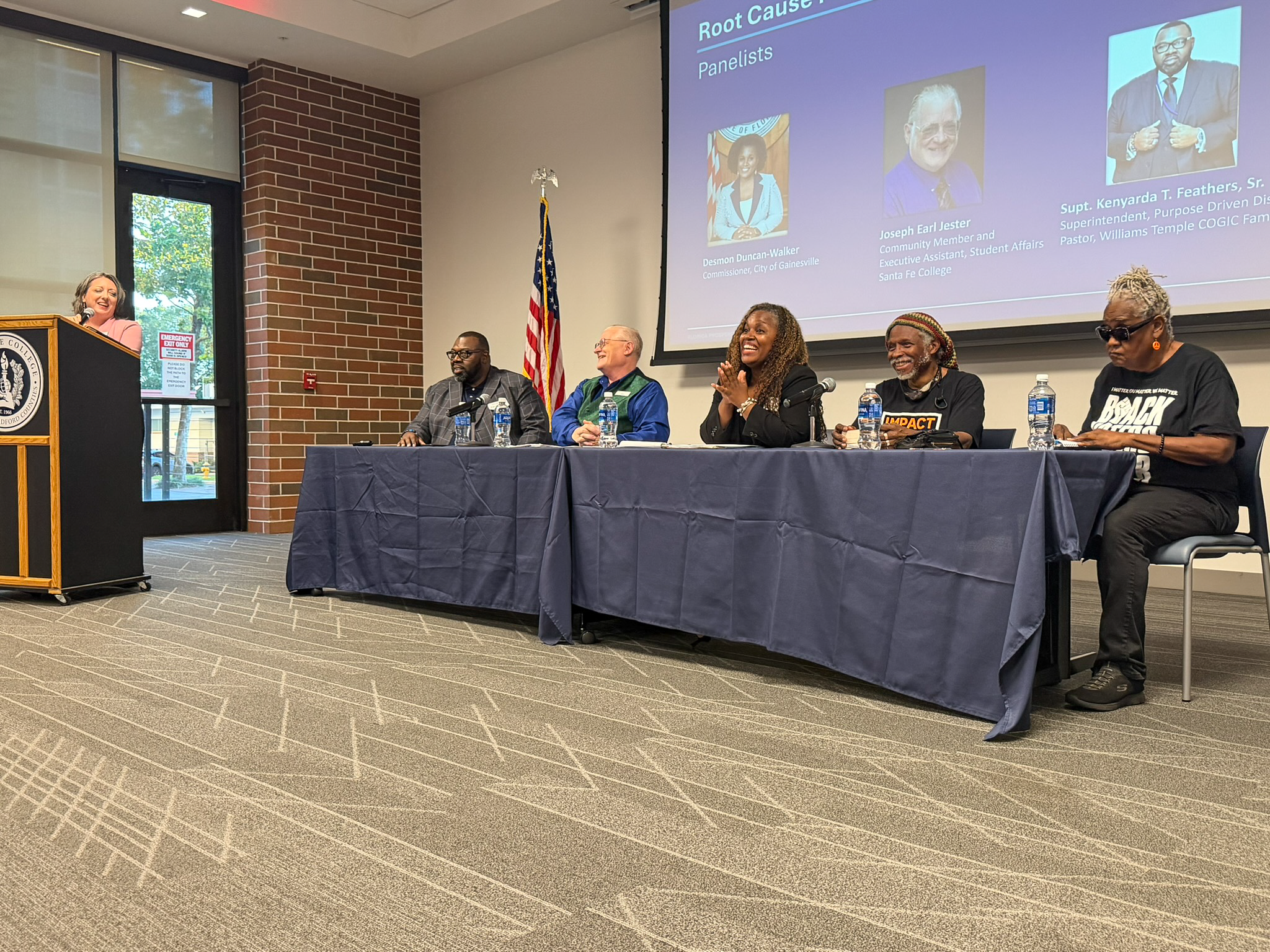panelists sitting a table