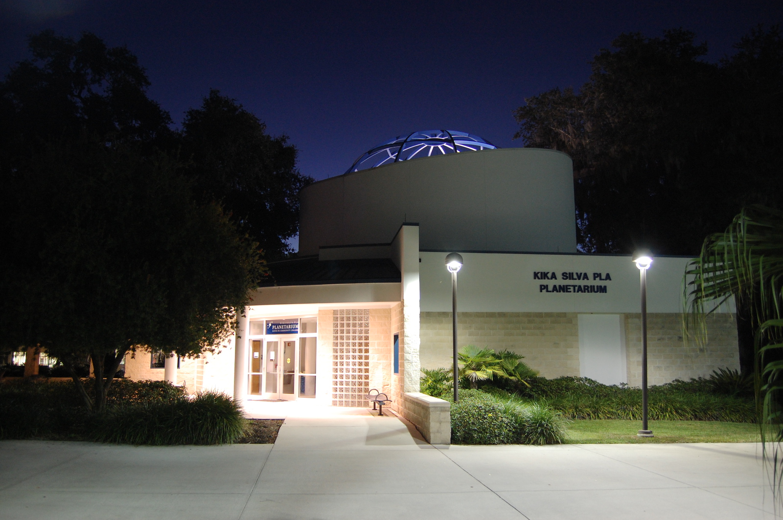 Outside image of the planetarium at night